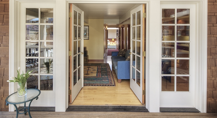 Glass doors on wooden patio